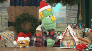 GIF of Kent Cook puppet from I Spot Santa showing his eyes and other holiday puppets in action