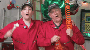 Chip and Bernie singing before Bernie gets hit with a wrench — a classic family-friendly comedy gag from long-time writer and director Pasquale Murena.